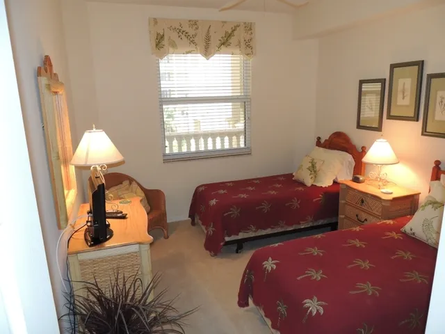 Guest room features twin beds and flat screen tv