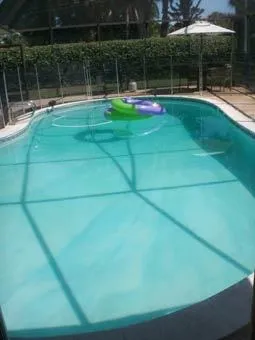 Charming Country Club of Naples Pool Home photo 1
