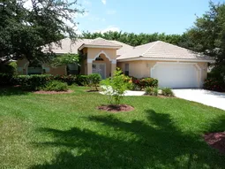 Situated on a cul de sac on a large, private lot.