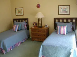 Two twin beds, opens to the pool.