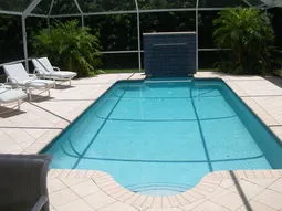Oversized heated pool with waterfall feature and full sun all day!
