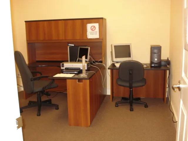 Business-Center with two computers and printer in clubhouse next to library