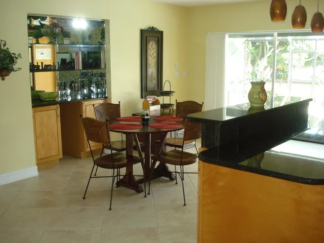 Open kitchen area from sliding pool doors