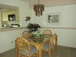 Spacious formal dining room with a pass through to the kitchen.