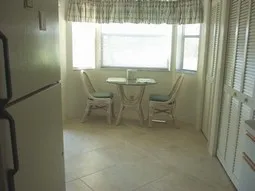 Breakfast nook off the kitchen. It has a beautiful view of the golf course