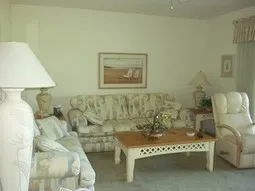 A lot of seating room in the spacious living room.