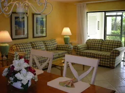 Spacious tiled living room dining area