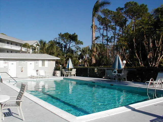 One of two sparkling Olympic sized pools, just a few steps from your door