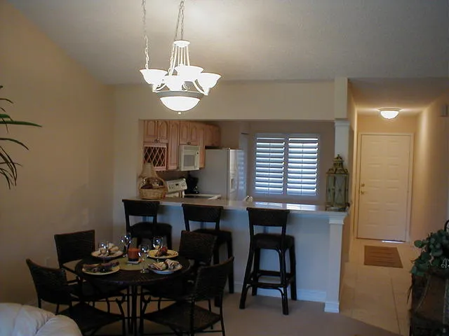 Open living/dining area, with Corian eating counter/workspace