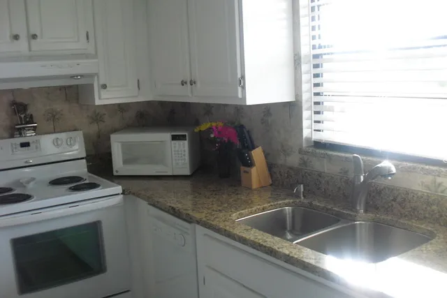 New granite, industrial sink, and faucet just installed!