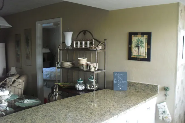 Kitchen bar/island w/ storage. Master suite to the right