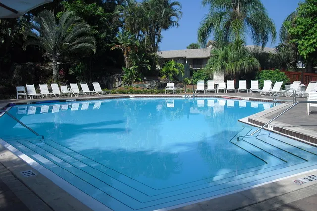 Sprawling pool with views of the waterfalls and pond, complete w restaurant