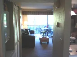 Unit 232 welcomes you~kitchen at right, laundry at left, then guest suite..