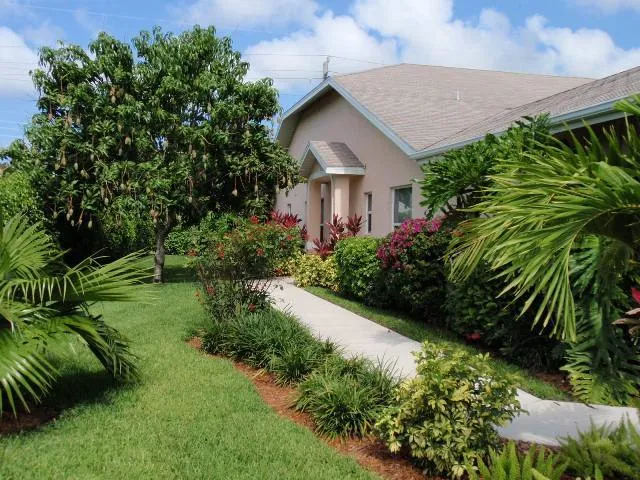 Lush Private Entry and Side Yard