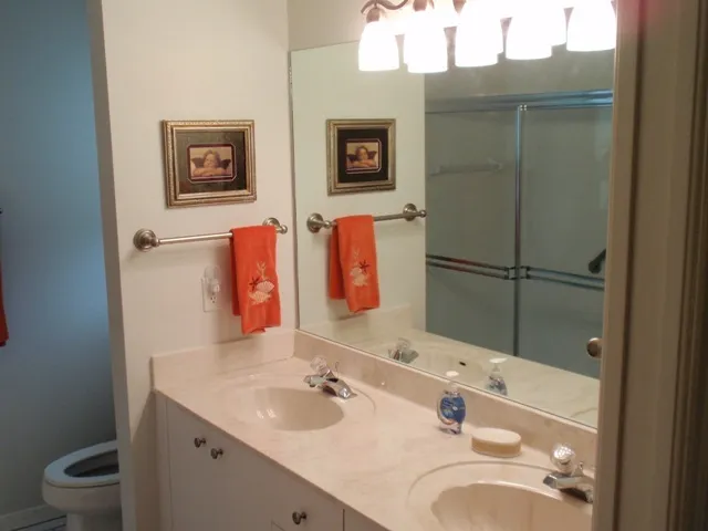Bath off of master bedroom with large walk-in shower