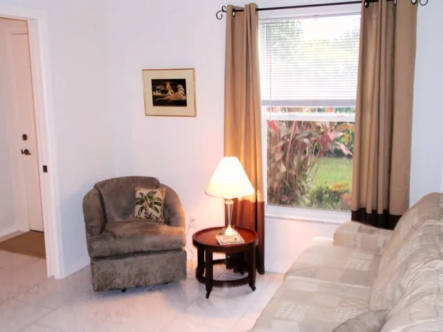 3rd bedroom/den with sleeper sofa and closet