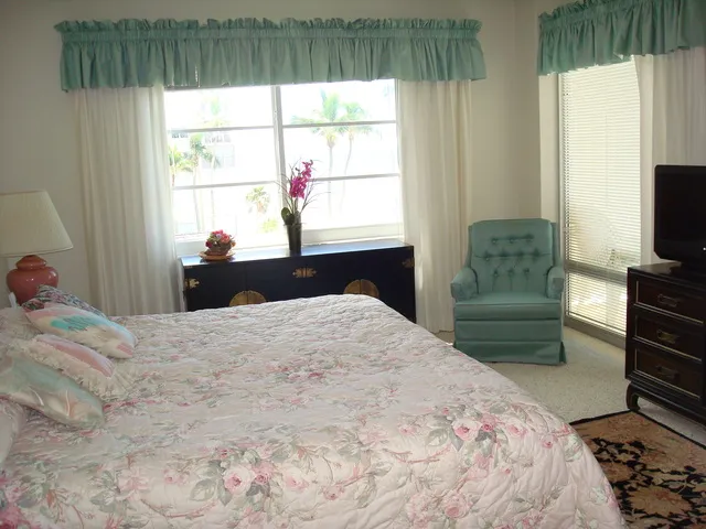 #402 king bedroom with TV & full views of the beach & gulf