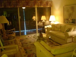 unit #412 living room with TV & full view of the beach & gulf