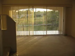 LivingRoom area and enclosed porch with view 
