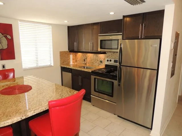 #215 - kitchen features granite and stainless steel - fully equipped