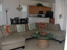 Living room with big screen television.