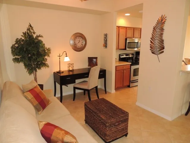The den connects to the kitchen 