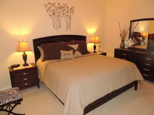 Master bedroom suite has a king bed, flat screen tv, private bath, & walk in closet