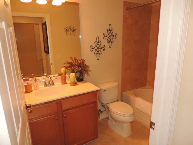 Guest bath has a tub / shower combo