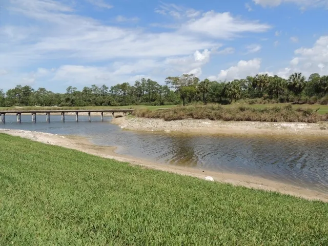 This condo has it all views of the lake, golf course, bridge, & sunsets
