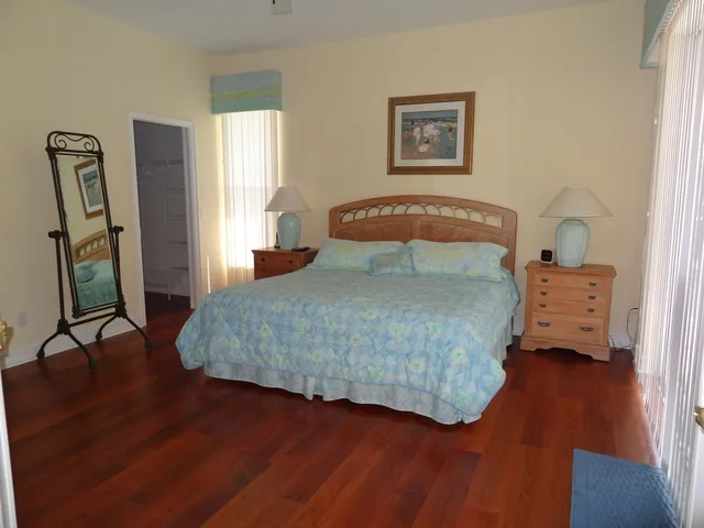 Mater bedroom suite with King size bed, walk-in closet and private bath. 