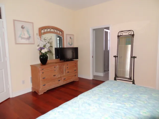 Master bedroom with large LCD television