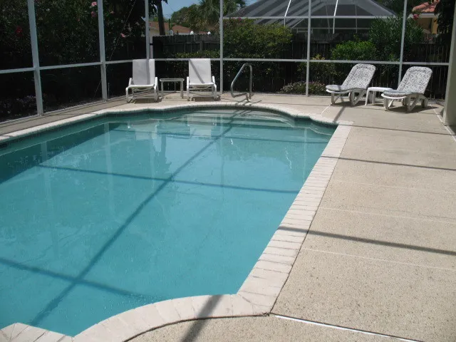 Heated pool with chaise lounges for sun bathing