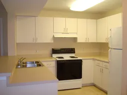 Kitchen opens to liv. rm. & lanai. 1 B/Rm & bath on each side of liv. area