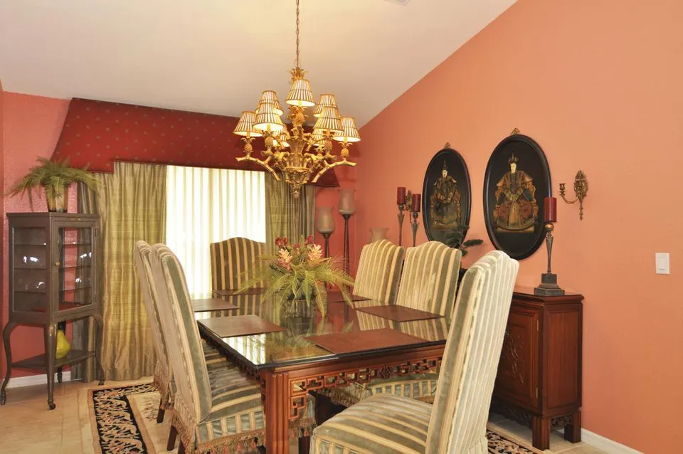 Our Diningroom continues to reflect the Chinoiserie influence in the Rosewood table and rosewood server.  The glass diningroom table can seat 6.