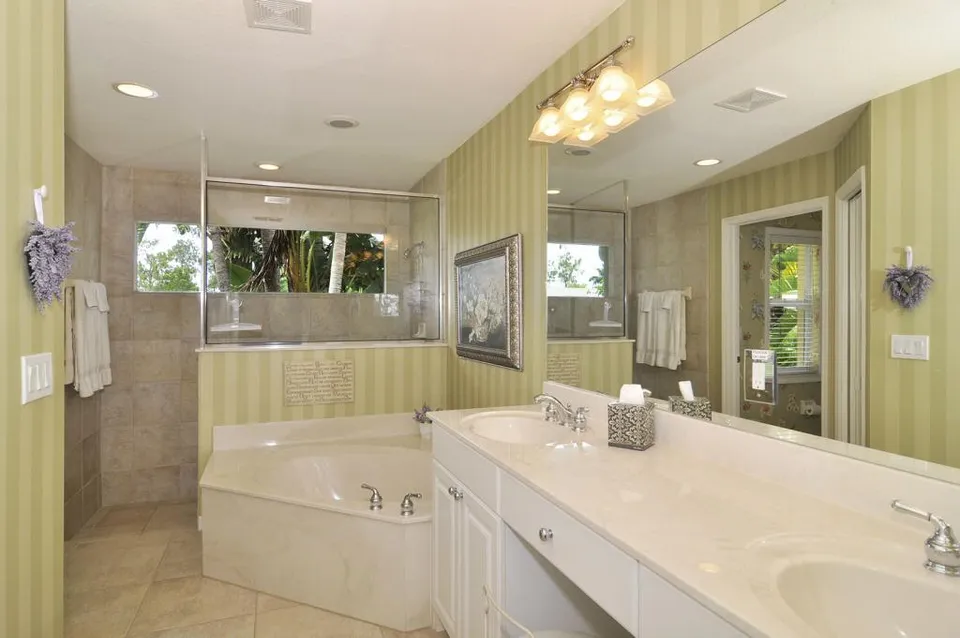 Master bath has a walk in shower as well, soaking tub and double vanities. 