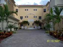 2nd fl unit, on rgt, 2 huge balconies, 2 car garage, fountains, water view