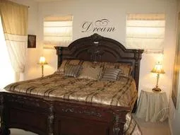 guest suite 1 w/full bath & balcony