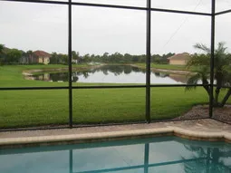 Lanai and pool area overlooking lake