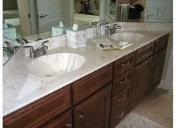 Jack and Jill bathroom that adjoins twin and queen-size bed bedrooms.
