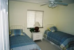 Comfy twin bedroom is next to second full bath