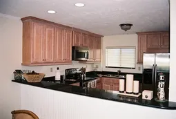 Open kitchen allows the chef to enjoy the view & conversation with guests!