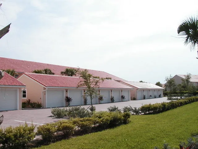 GARAGES AND PARKING SPACES AT THE REAR OF THE CONDO