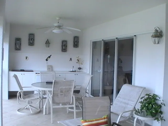 Large lanai with out door kitchen, Lanai is approx 26' long.