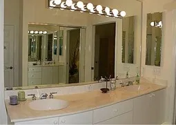 Master bath with walk in closet.Double walk in shower and his and her sinks