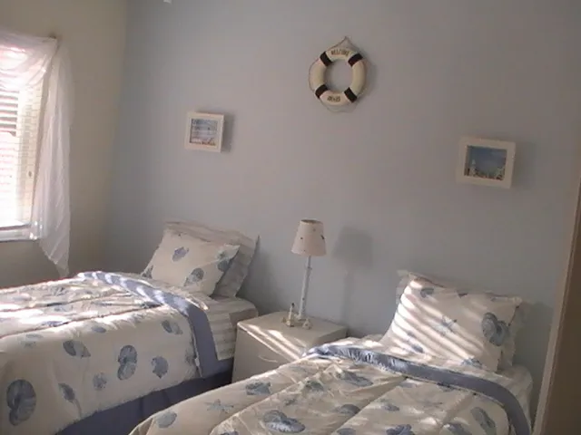 Beautiful Coastal theme guest room, next to guest bathroom.