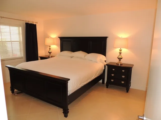 #110 Master suite has a king bed, tv, & private bathroom