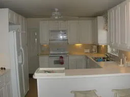  Bright Eat in kitchen with corian countertops