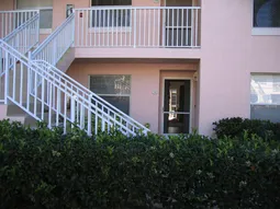 First floor entrance near pool.