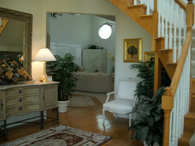 Beautiful front entry area with staircase to second level.
