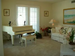 Sitting room with Player Piano and sleeper sofa